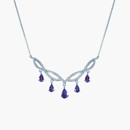 Kolia Savicki: białe złoto, tanzanity